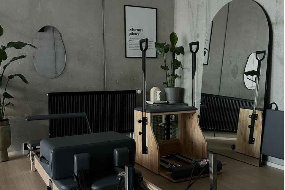 The Reformer and Wunda chair in the equipment room